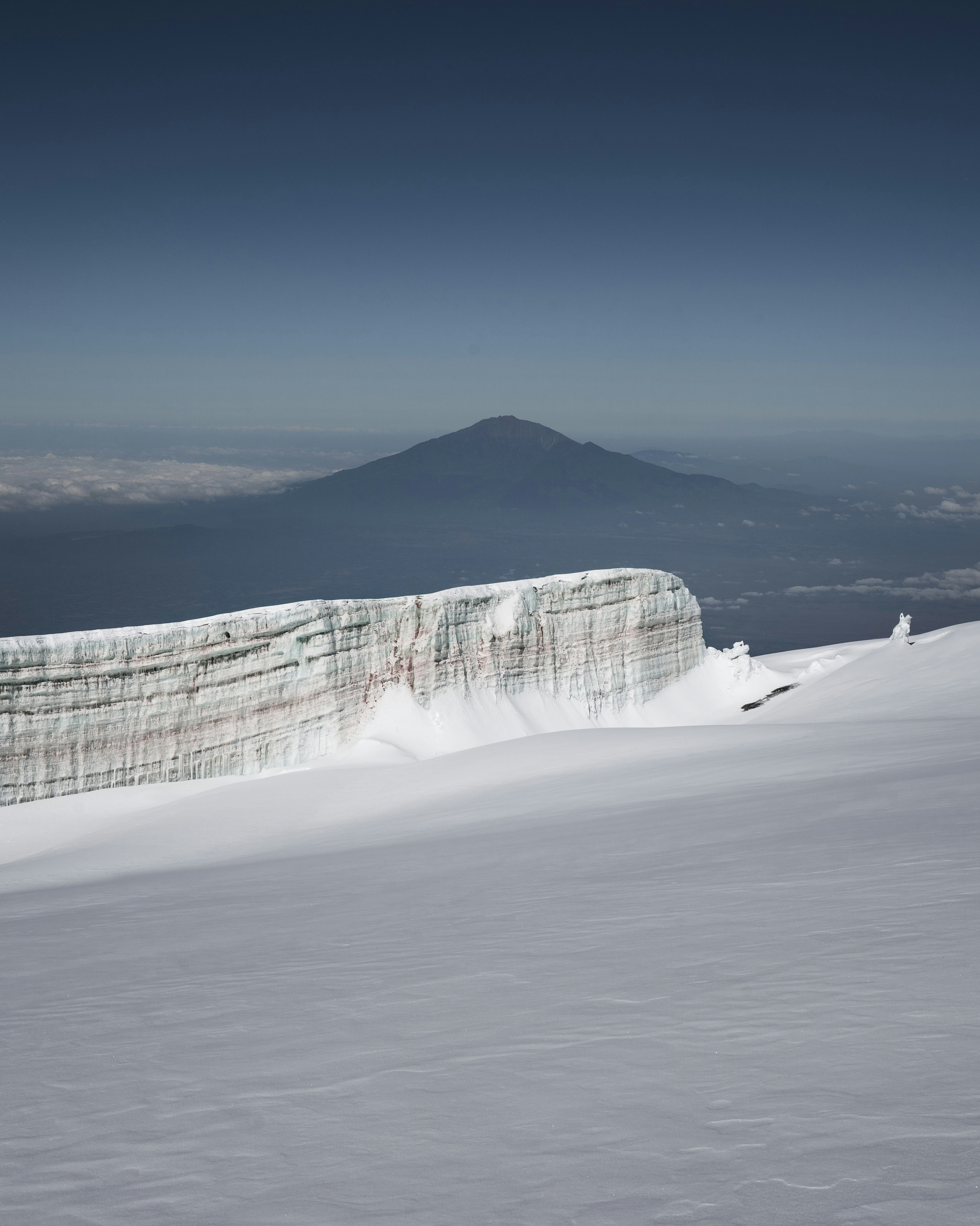 white and black mountain under blue sky during daytime